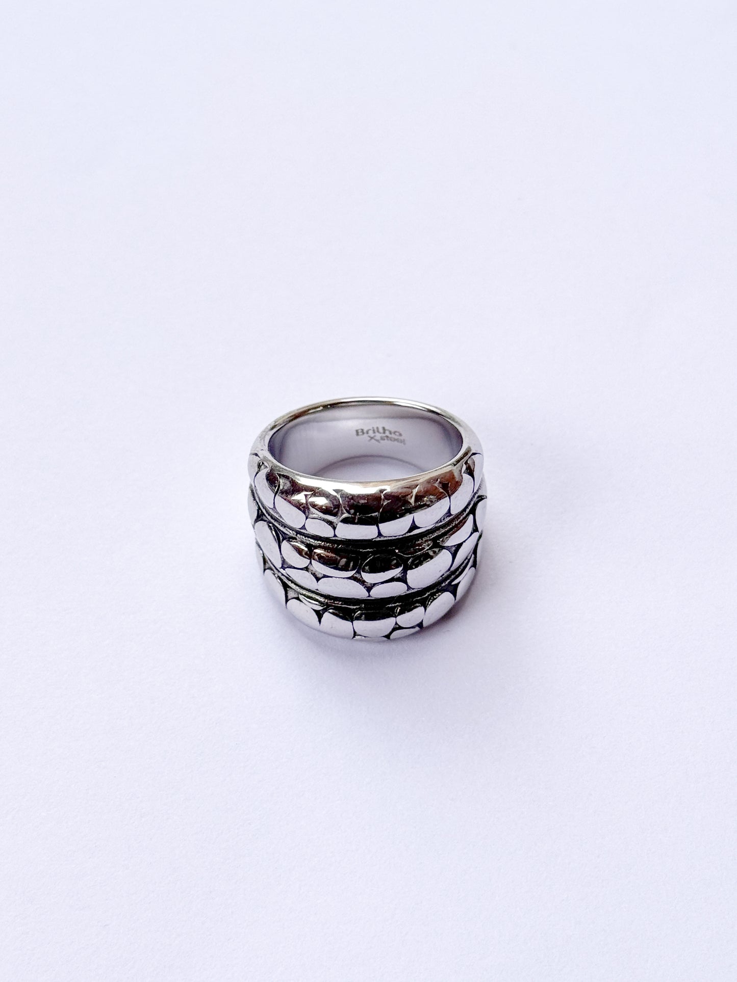 Anillo orbitas plateadas