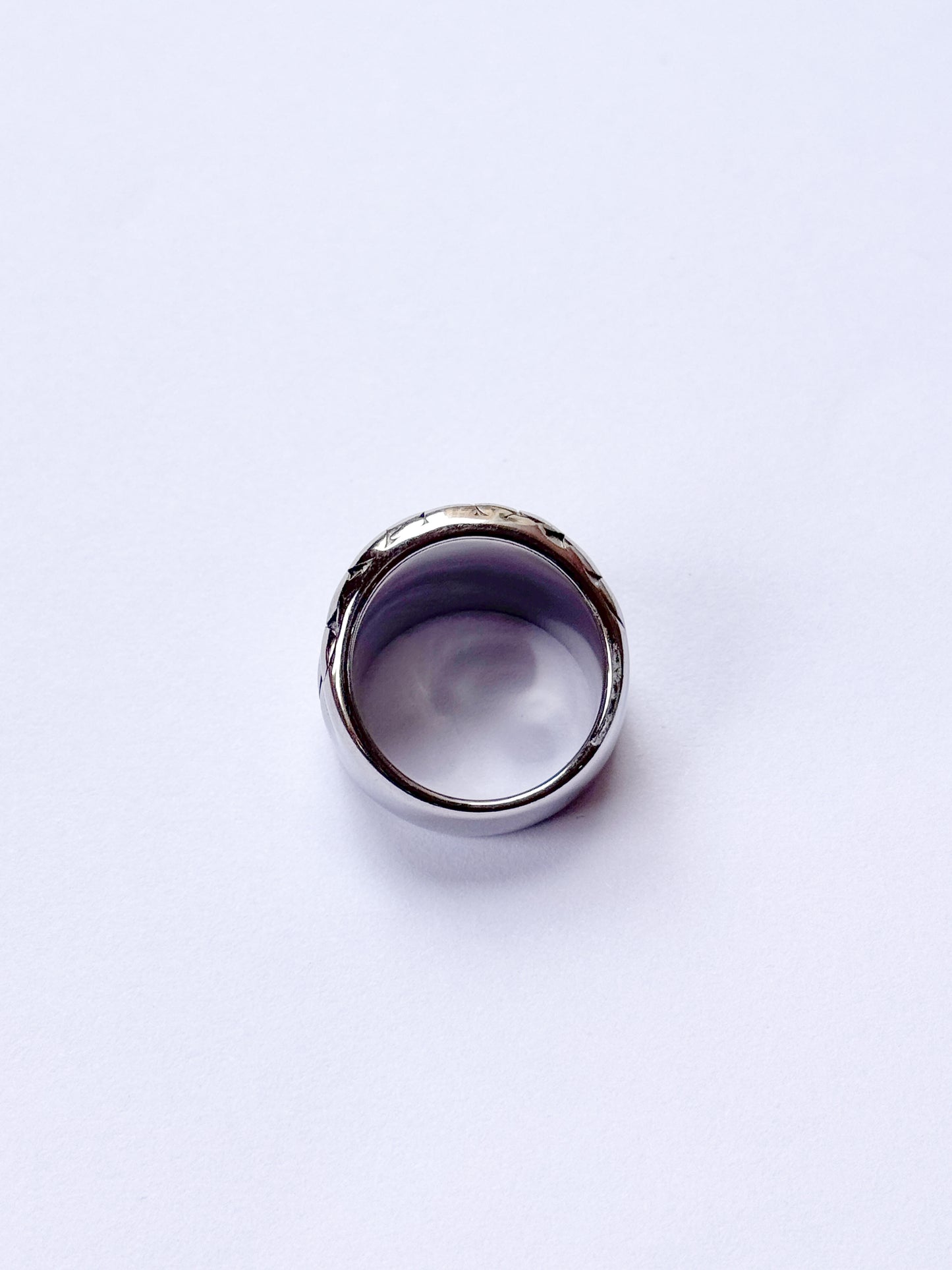 Anillo orbitas plateadas
