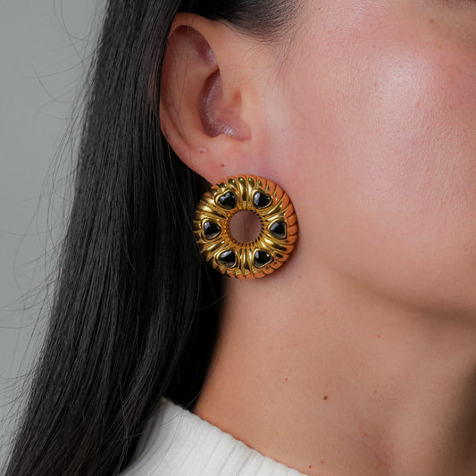 Aretes en forma de dona dorados