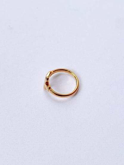 Anillo cruz dorada