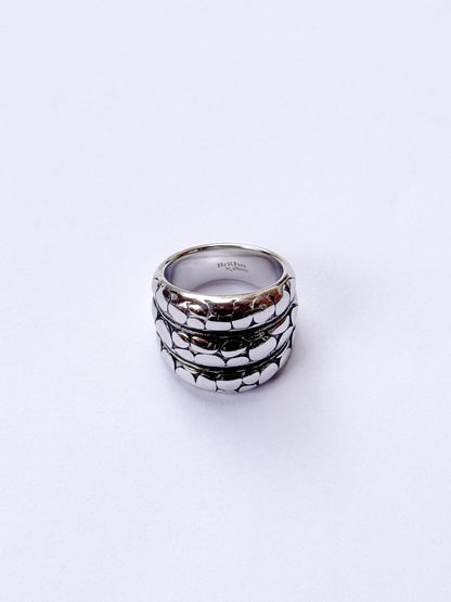 Anillo orbitas plateadas